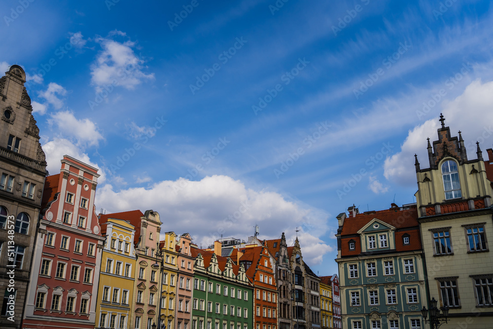 View of old buildings of Market Square and cloudy sky in Wroclaw