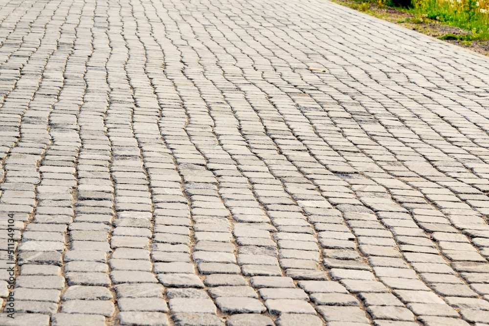 Creative background. Old cobblestone road background Creative background. Old cobblestone road background