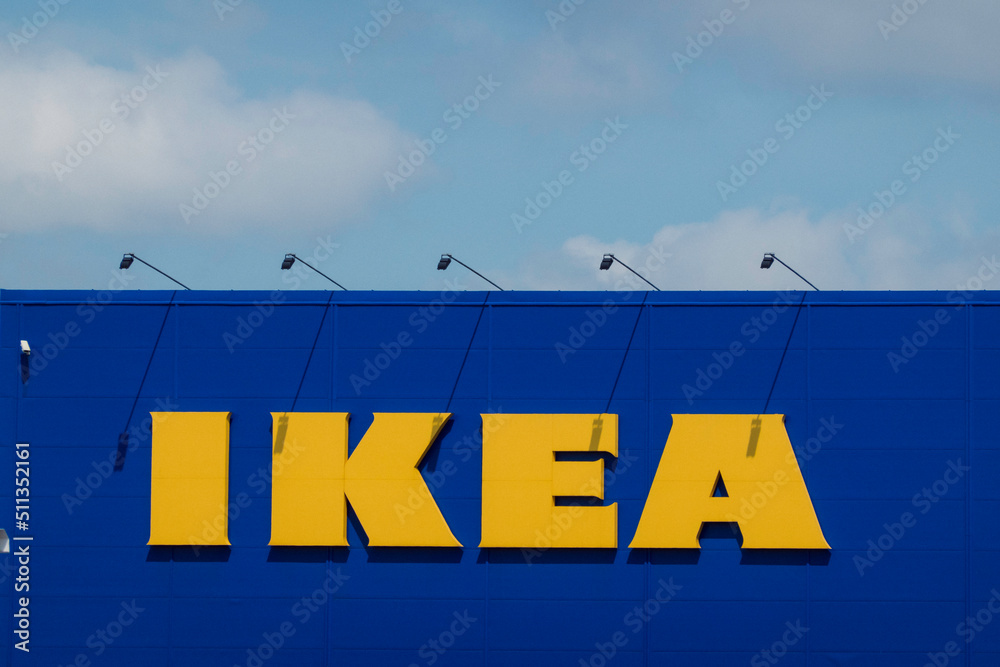 Vilnius, Lithuania - June 09, 2022: IKEA logo sign on Ikea shop wall. Ikea  is multinational conglomerate that designs and sells ready to assemble  furniture, kitchen appliances and home accessories Stock 写真 | Adobe Stock