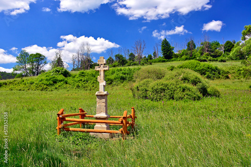 Wayside old stone cross of Nieznajowa, Low Beskids (Beskid Niski), Poland.