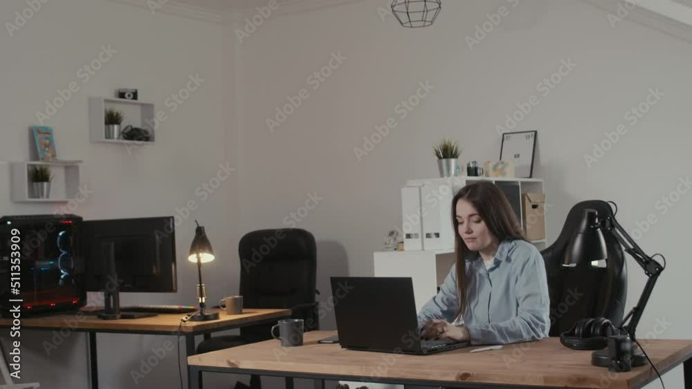 Girl web studio designer working on a laptop Girl web studio designer working on a laptop