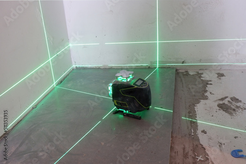 the laser level marks the lines for marking on the construction site