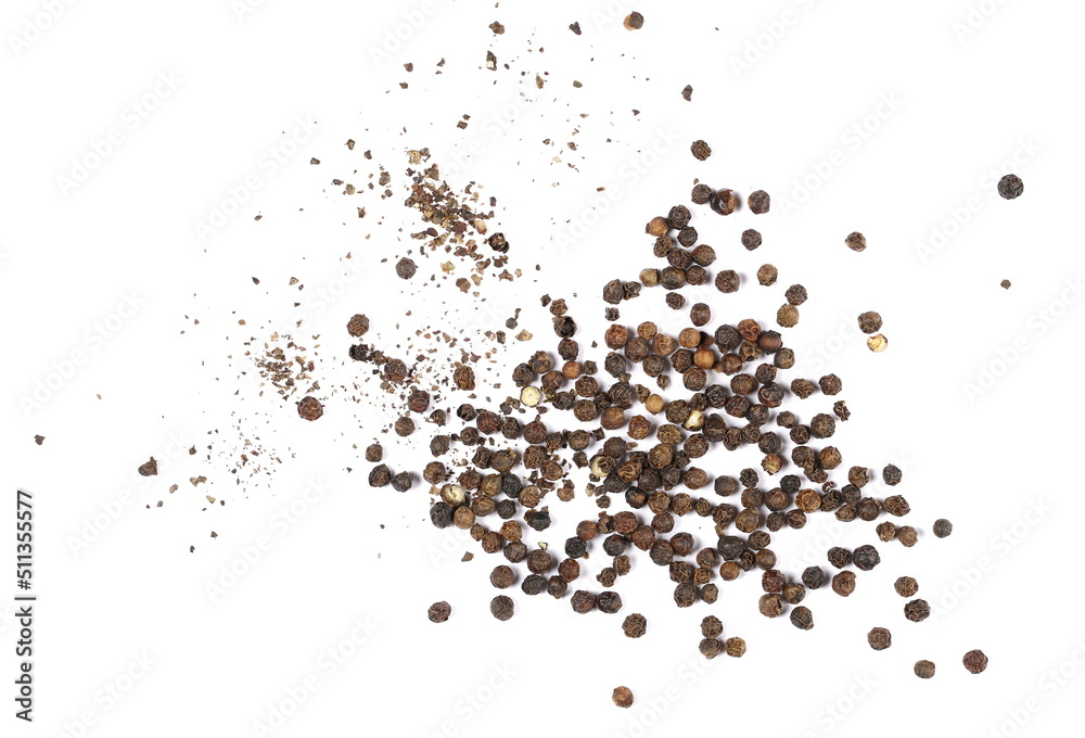 Fototapeta premium Minced black pepper and grains, ground peppercorn pile isolated on white, top view