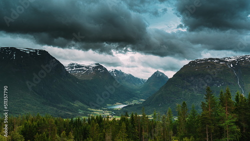 Byrkjelo Village, Sogn Og Fjordane County, Norway. Beautiful Sky Above Norwegian Rural Landscape. Bergheimsvatnet Lake In Summer Day. Agricultural And Weather Forecast Concept. 4k. photo