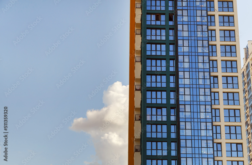 Contemporary high-rise apartment buildings, frame-block construction, ventilated glass facade