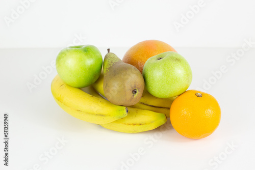 exotic fruits on white surface