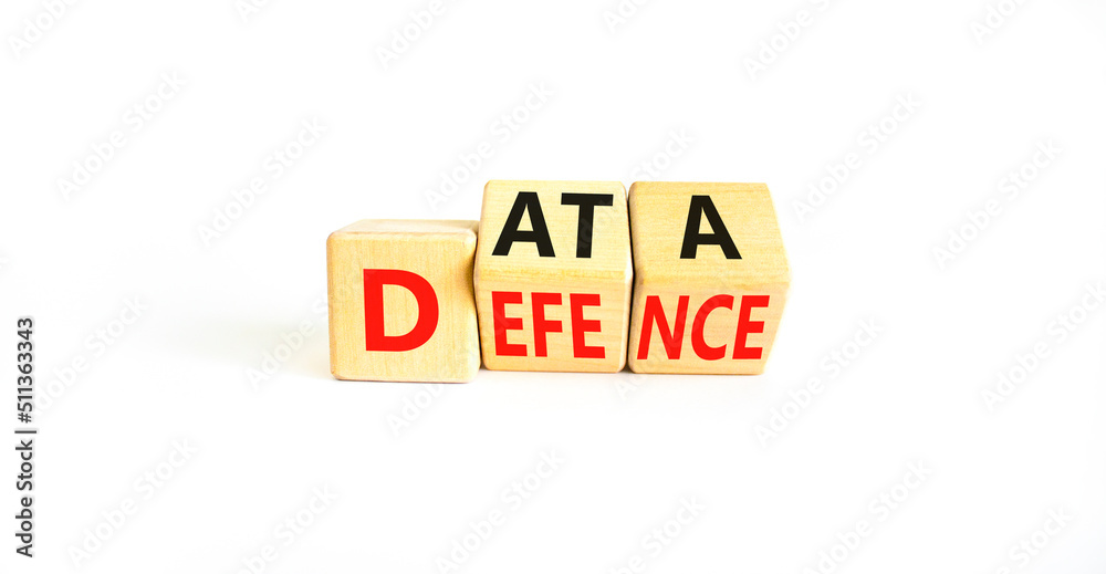 Data defence symbol. Concept words Data defence on wooden cubes. Beautiful white table white background. Business and cyber crime concept. Copy space. Data defence symbol. Concept words Data defence on wooden cubes. Beautiful white table white background. Business and cyber crime concept. Copy space.