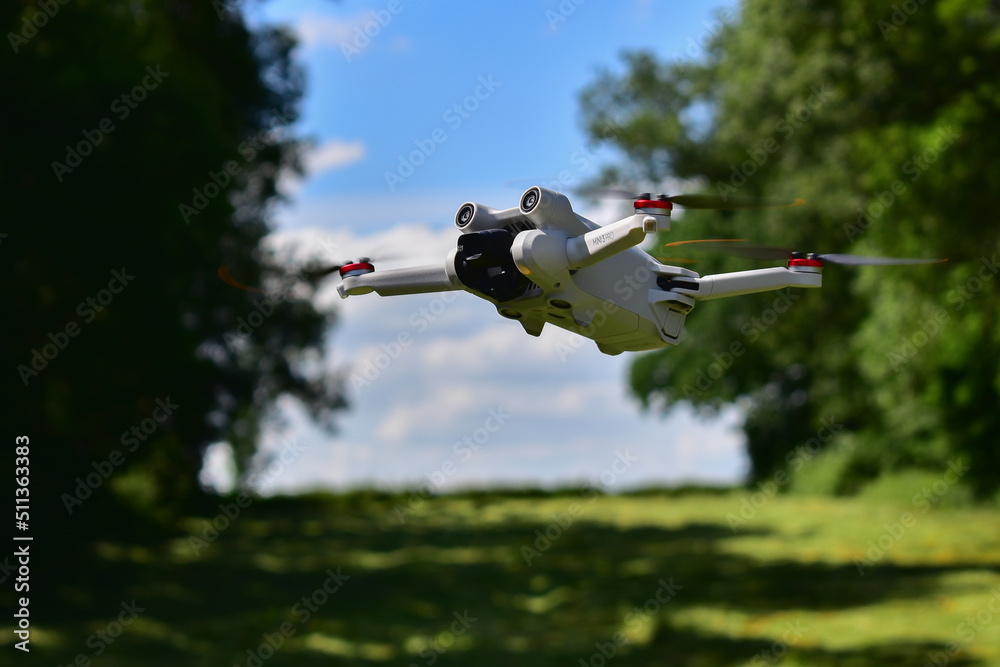 Waremme, Belgium - June 12, 2022: DJI Mini 3 Pro drone hovering Stock Photo  | Adobe Stock