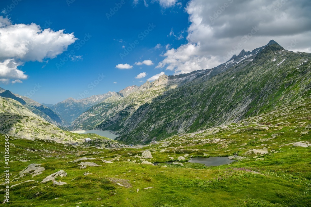 View on beautiful mountains and small lake in Grimselpass in Switzerland