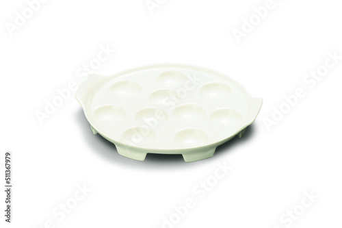 Simple white ceramic escargot plate  isolated on white