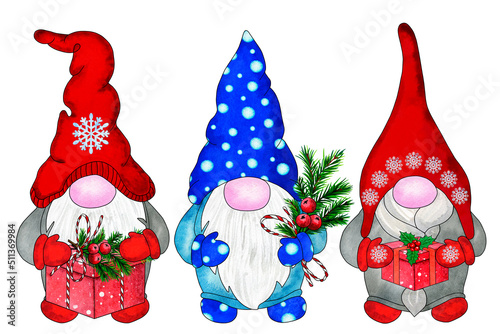 Three Christmas gnomes with gifts photo