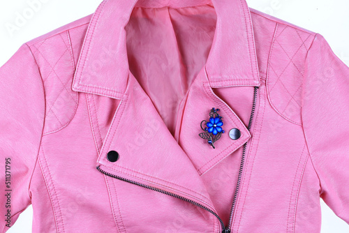 Photo jewelry brooch on pink clothes