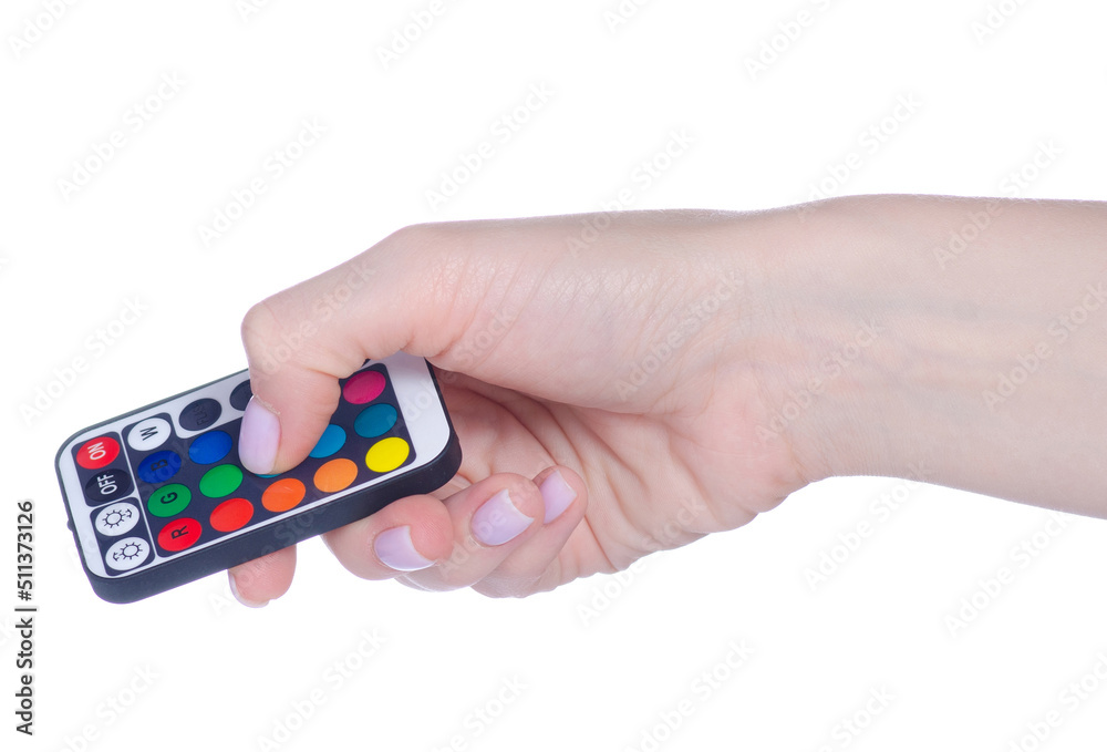 Fototapeta premium LED strip remote control in hand on white background isolation