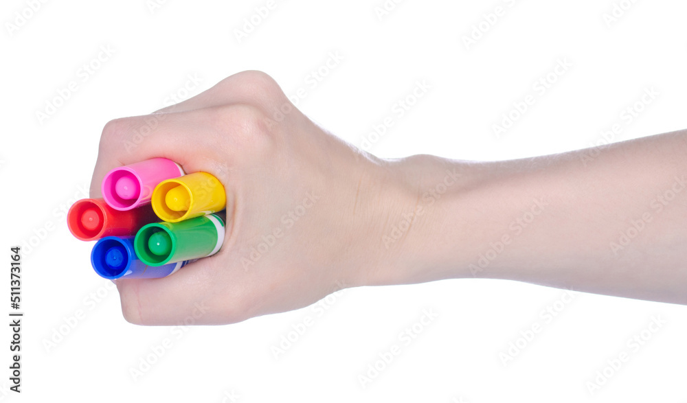 Many markers in hand on white background isolation Many markers in hand on white background isolation