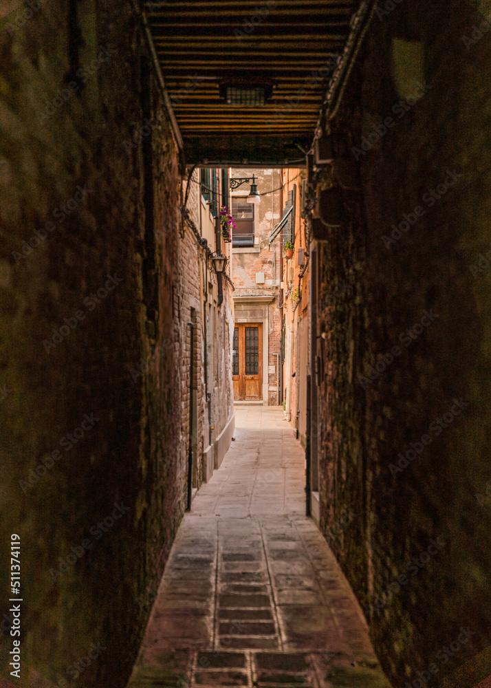 narrow street alley in Venice, Italy 