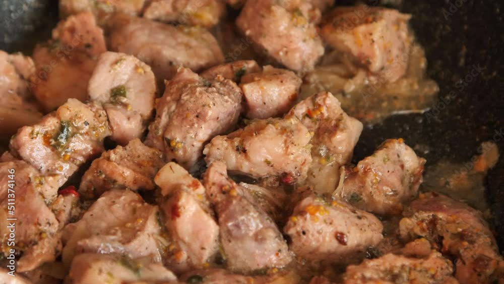 meat dinner. Stirring in a pan. Sliced beef in its own juice, with spices and pickled onions meat dinner. Stirring in a pan. Sliced beef in its own juice, with spices and pickled onions