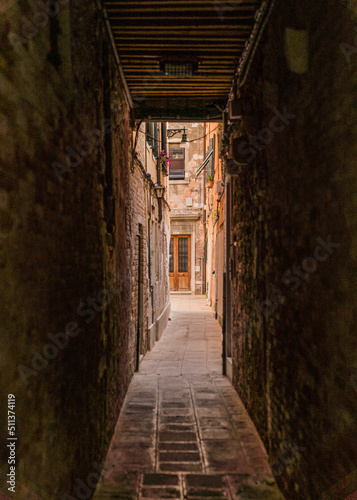 narrow street alley in Venice, Italy  © gammaphotostudio