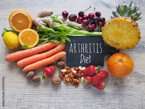 Healthy foods to help arthritis pain. Assortment of fresh fruit and vegetable for arthritis and inflammatory pain. Inflammation fighting foods, concept of rheumatoid arthritis diet. photo