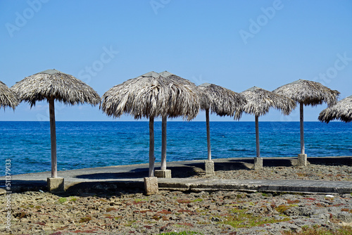 Fototapeta Naklejka Na Ścianę i Meble -  wooden sunshades at the beach of havana miramar