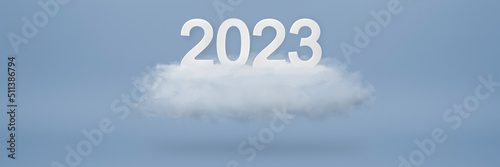 Happy New Year 2023 greeting template. Festive 3d banner with white numbers 2023 on white cloud and blue background. Festive poster or banner design.