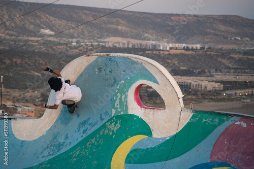 Skateboarder at skatepark in Taghazout, Morocco