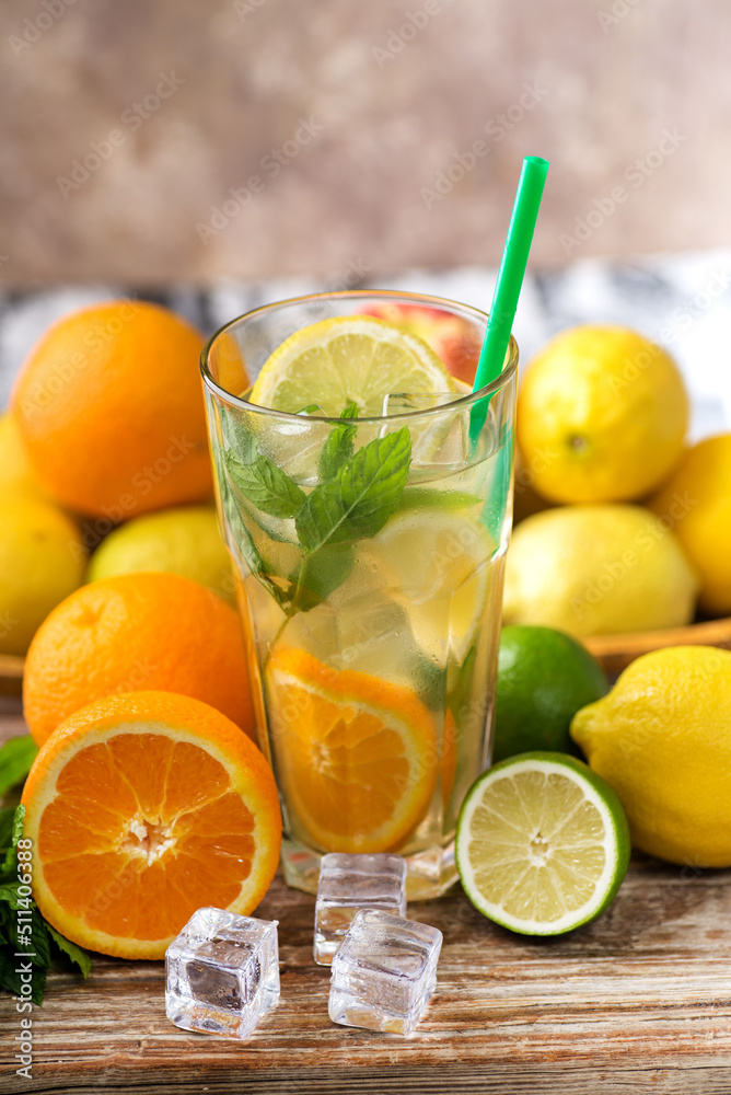 glas with lemonade or mojito cocktail with lemon and mint, cold refreshing drink or beverage with ice glas with lemonade or mojito cocktail with lemon and mint, cold refreshing drink or beverage with ice