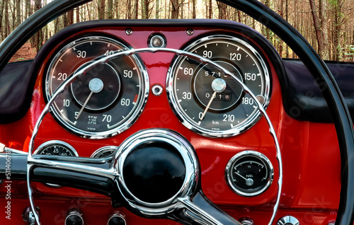 Old sports car dashboard, vintage film style image