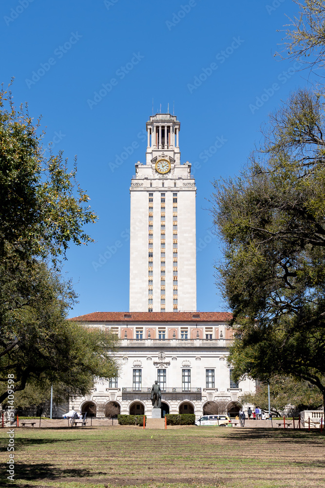 Austin, Texas,  USA - March 18, 2022: The Main Building at the center of the University of Texas at Austin campus in Downtown Austin. UT Austin is a public research university. 