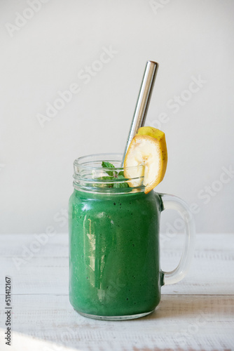 smoothie mug with spirulina and banana