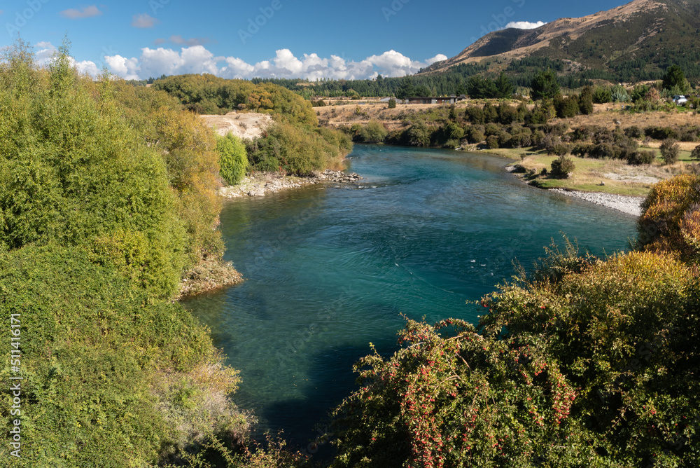 The clear Hawea River flowing between Lake Hawea and Albert Town, Otago, South Island, New Zealand. The clear Hawea River flowing between Lake Hawea and Albert Town, Otago, South Island, New Zealand.