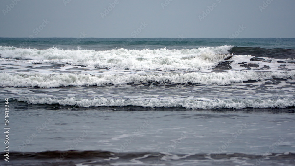 Waves breaking on the beach in Canoa, Ecuador