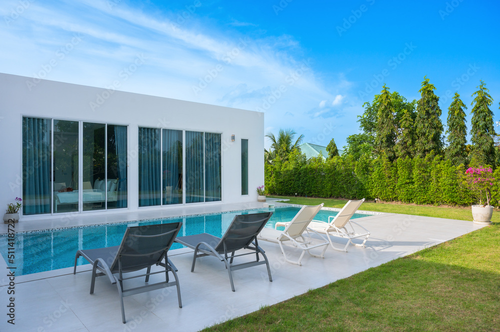 Fototapeta premium Chairs pool for relaxing by the pool in the house.