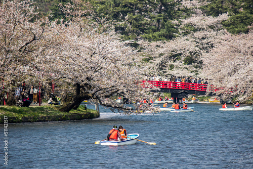 Hirosaki Cherry Blossom Festival 2018 at Hirosaki Park,Aomori,Tohoku,Japan on April 28,2018:Beautiful cherry blossoms and Shunyobashi Bridge across the western moat in spring. photo