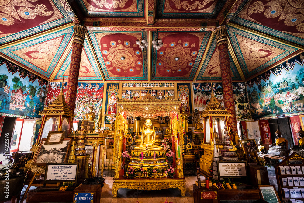 Fototapeta premium The gold statue of Phra Si Ari Buddha at Wat Lai, Lopburi, Thailand.