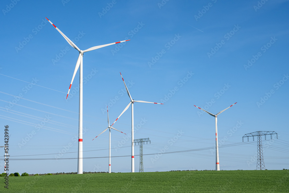 Wind turbines and power lines seen in Germany Wind turbines and power lines seen in Germany