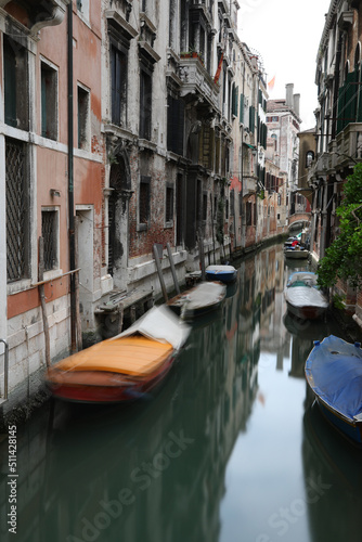 Fototapeta Naklejka Na Ścianę i Meble -  foreshortening of navigable canal of Venice Island in Italy with long exposure effect