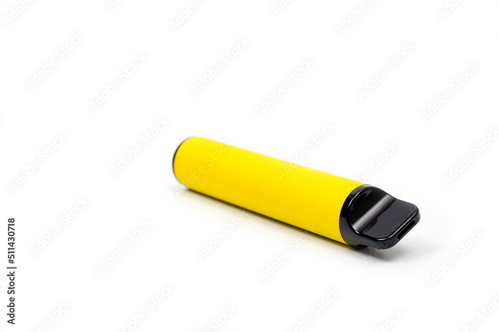 A disposable electronic cigarette in a yellow body, photographed against a white background. A disposable electronic cigarette in a yellow body, photographed against a white background.