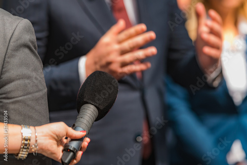 Journalist Conducting an Interview, Politician Answering Questions.
