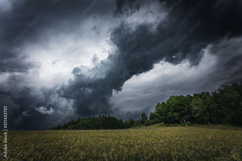 Dramatic thunderclouds and storm clouds in summer. Dramatic thunderclouds and storm clouds in summer.