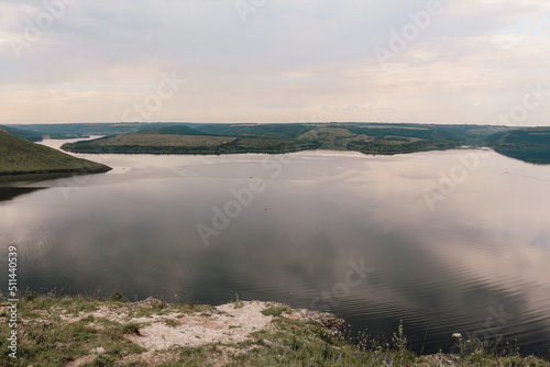 The landscape of Bakota Bay on the Dniester river  Ukraine. The banks of a large river. A calm smooth water view.