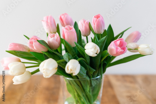 Fototapeta Naklejka Na Ścianę i Meble -  Bouquet of delicate pink and white tulips in a vase.