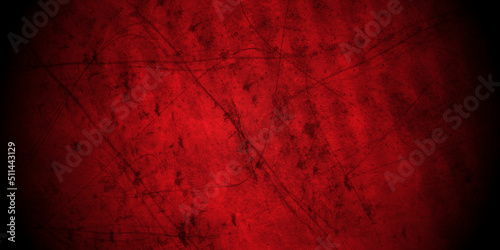 Red grunge backdrop background with paint stains and spatter and old vintage grunge texture design, elegant rich Christmas red color for the holidays.