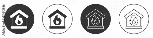 Black Fire in burning house icon isolated on white background. Circle button. Vector