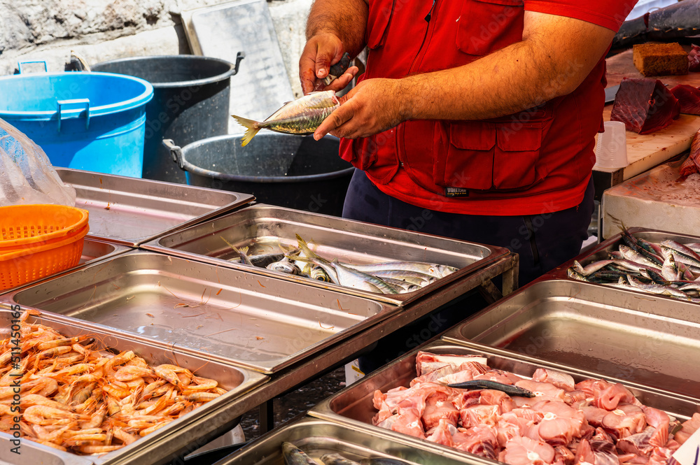 fish market in city , lifestyle of a marine port worker closeup