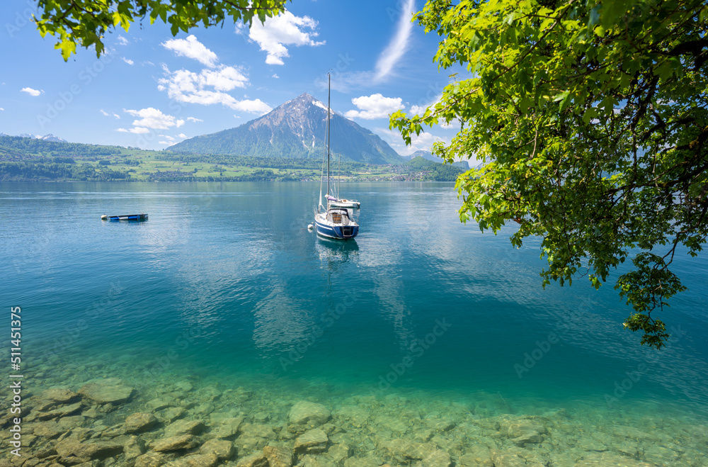 crystal clear water of Thun Lake in Switzerland