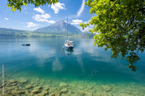 crystal clear water of Thun Lake in Switzerland