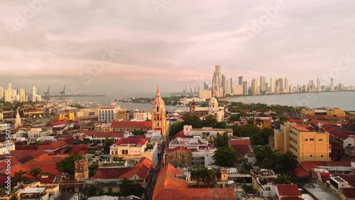 Cartagena, Colombia: Aerial drone footage of the famous Cartagena de Indias colonial old town with the cathedral and the Bocagrande towers in the back by the caribbean sea in Colombia, South America