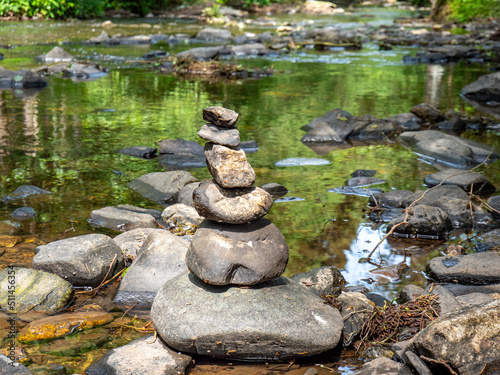 balance stones in the water