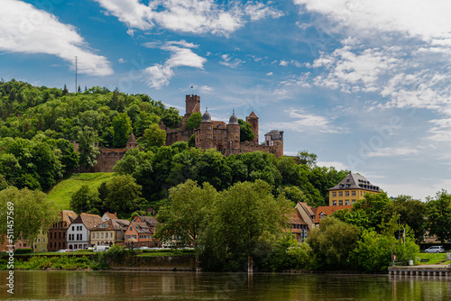 Burg Wertheim Landscape Photo with Cloudy Sky. medieval Castle in Germany Next to Majna River in a beautiful valley. German name is Burg Werheim. Amazing view in clear daylight