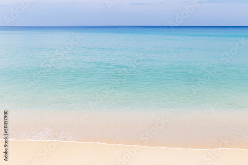 Beautiful summer beach in south of Thailand, clean sandy beach with clear blue sea water, tropical nature background